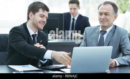 employees working with financial documents in the office Stock Photo