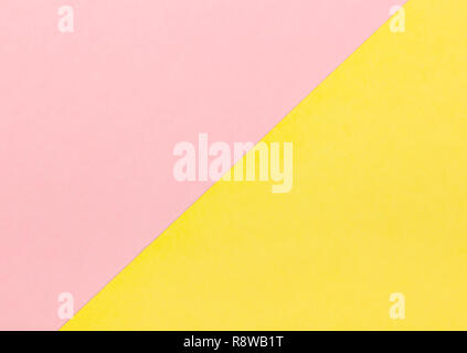 Background with pastel pink and yellow color. Flat Lay. Stock Photo