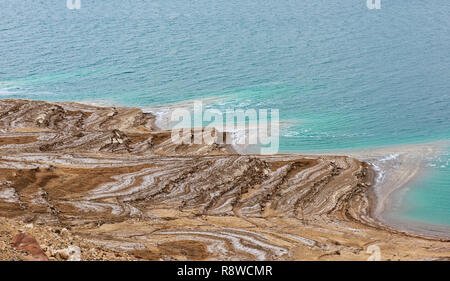 Landscape of the Dead Sea,Jordan, beautiful coast failures of the soil and the strong shallowing of the sea,illustrating an environmental catastrophe Stock Photo