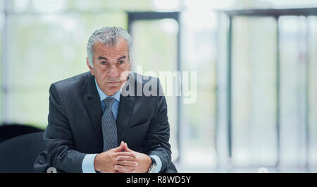 Portrait confident, serious senior businessman Stock Photo