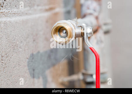 Ball valve on the pipe in the closed position Stock Photo