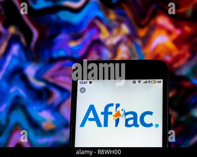 Aflac Insurance company logo seen displayed on smart phone Stock Photo Aflac Insurance company logo seen displayed on smart phone Stock Photo