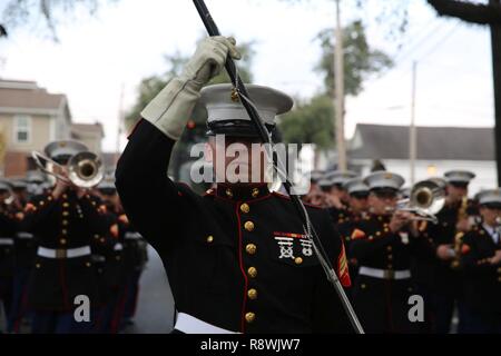 Sgt. Nathan Johnson performs his duties as the drum major for the 2nd Marine Aircraft Wing Band during a Mardi Gras Parade in New Orleans, Feb. 28, 2017. Mardi Gras is traditionally a time for people to feast before the time of lent where they will then fast. The 2nd MAW band provided traditional Mardi Gras music along with the national anthem, the Marines’ Hymn and other classics during the parades. Stock Photo