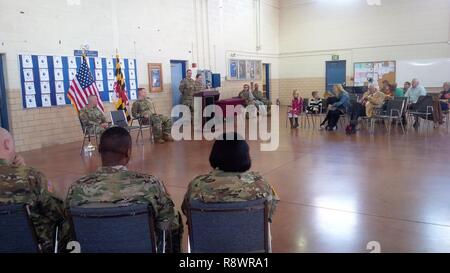 ANNAPOLIS, Md., - After assuming command of the 110th Information Operations Battalion, Lt. Col. Kristine Henry addresses her soldiers at the Maryland Army National Guard’s Annapolis Readiness Center, March 11, 2017. Henry took over command of the unit from Lt. Col. Daniel S. Williams during a change of command ceremony hosted by the commander of the 58th Military Intelligence Brigade, Col. Brian T. Connelly. Stock Photo