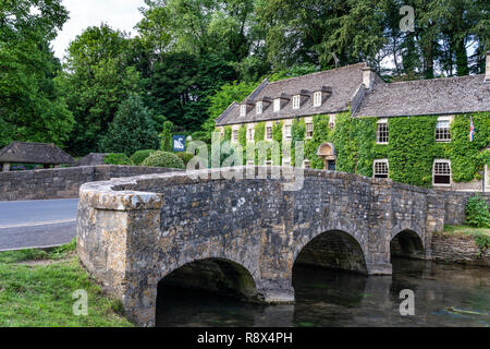 The Swan Hotel along the  River Coln in the Cotwold village of Bibery, England, Europe. Stock Photo
