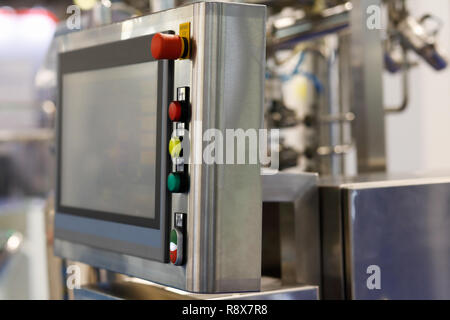 Modern industrial control panel with a touch screen. Stock Photo