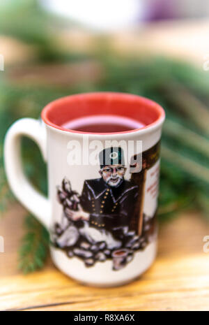 Christmas Hot mulled wine for winter on rustic table with copy space. Stock Photo