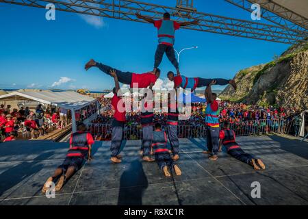 Papua New Guinea, Gulf of Papua Region, National Capital District, City of Port Moresby, during Walk for Life weekly walk organised every Sunday morning as part of a public health program, Bomana prisonners are presenting an acrobatic show Stock Photo