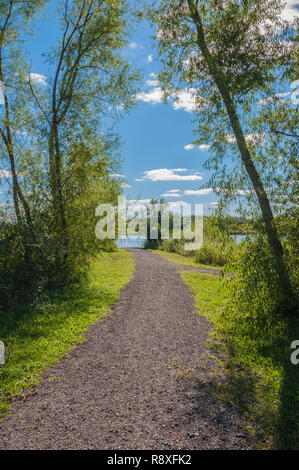 Big Woods Lake located in Cedar Falls, Iowa photographed during beautiful colors and clouds. Stock Photo