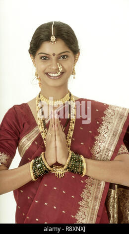 Indian woman folded hands namaste namaskar namaskara India Asia MR#627 Stock Photo