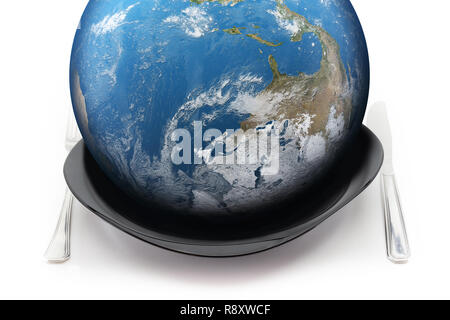 Consuming our Planet, concept. Earth served on plate. Stock Photo