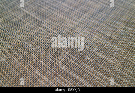 Closed up diagonal basket-weave pattern of a luncheon mat for background or banner Stock Photo