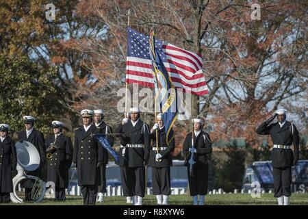The U.S. Navy Ceremonial Guard helps conduct military funeral honors with funeral escort for U.S. Navy Seaman 1st Class William Bruesewitz in Section 60 of Arlington National Cemetery, Arlington, Virginia, Dec. 7, 2018. On Dec. 7, 1941, Bruesewitz was assigned to the battleship USS Oklahoma which was moored at Ford Island, Pearl Harbor when the ship was attacked by Japanese aircraft. After sustaining multiple torpedo hits, the USS Oklahoma quickly capsized and resulted in the deaths of 429 crewmen, including Bruesewitz.    From the Defense POW/MIA Accounting Agency (DPAA) new release: Followin Stock Photo