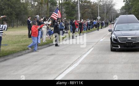 U.S. Secret Service Agents escort the remains of former president George H. W. Bush, the 41st President of the United States, to Ellington Field Joint Reserve Base in Houston, Texas, Dec. 3, 2018. Nearly 4,000 military and civilian personnel from across all branches of the U.S. armed forces, including Reserve and National Guard components, provided ceremonial support during George H.W. Bush's state funeral. Stock Photo