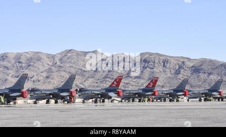 U.S. Air Force F-16 Fighting Falcons with the 187th Fighter Wing, Montgomery Regional Air National Guard Base, Ala., sit on the flightline March 7, 2017, during Red Flag 17-2 at Nellis Air Force Base, Nev. Red Flag is a realistic combat training exercise involving the air, space and cyber forces of the U.S. and its allies and is conducted on 2.9 million acres, ground and air, on the Nevada Test and Training Range.