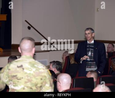 The Hon. Robert M. Speer, the Acting Secretary of the Army, speaks with Soldiers and Civilians at a town hall meeting during a visit to Joint Base Langley-Eustis, Virginia March 17, 2017. Mr. Speer received briefings from TRADOC senior leaders, visited Soldiers in training, and received a tour of the base. Stock Photo