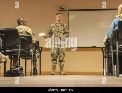 Lt. Col. Christopher Lindner, deputy commander for inpatient services, William Beaumont Army Medical Center, discusses challenges he’s faced as a leader and the importance of being humble to an audience during the Heart and Tenacity of a Leader conference, at WBAMC, March 15. The conference, a leadership and mentoring session with multiple presenters, presented patrons the challenges and responsibilities of leadership at all levels within an organization. Stock Photo