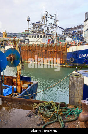 Rusty fishing vessels in the harbour at Camber Docks, Portsmouth Stock Photo