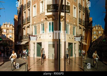 France, Pyrenees Orientales, Perpignan, city center, reflection of a street scene of the city center in the window of a shop Stock Photo