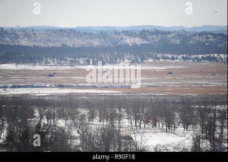 The explosion from a TOW missile is seen from firing point 5 on range 19 at Fort McCoy, Wis., on March 14, 2016. The  BGM-71 TOW is a Tube-launched, Optically tracked, Wire-guided  anti-tank missile currently manufactured by Raytheon. Stock Photo