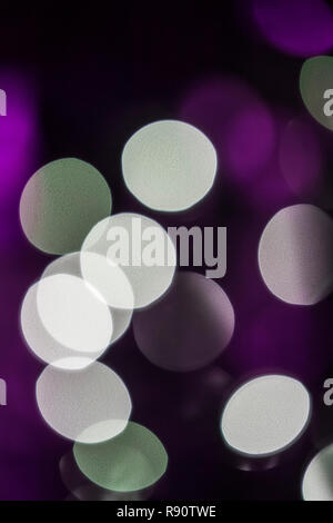 Bokeh created by blurred Christmas tree lights Stock Photo