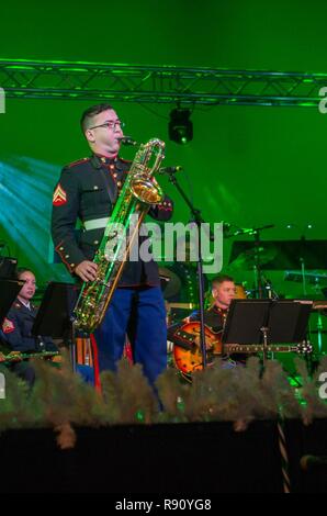 Cpl. Joseph De La Garza, a musician with the Marine Forces Reserve Band, performs a saxophone solo during the annual holiday concert at Saenger Theatre in New Orleans, Dec. 9, 2018. The performance is one of several holiday concerts the band arranged throughout December to promote the Marine Corps Reserve Toys for Tots program, which donates toys to less fortunate children in the community. Stock Photo