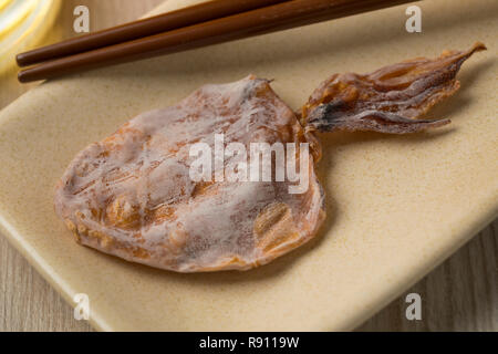 Japanese dried and grilled seasoned squid snack Stock Photo