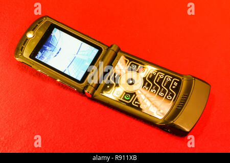 Rome, Italy - March 04, 2008: Pre smartphone era Old clamshell GSM mobile phone Stock Photo