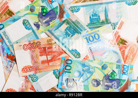 Heap of mixed paper notes of the Russian ruble of different issues and face value. Top view. Stock Photo