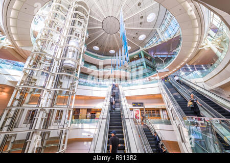 TOKYO, JAPAN - September 1, 2015: Passengers enter Haneda Airport. Haneda is one of the two primary airports that serve the Greater Tokyo Area. Stock Photo