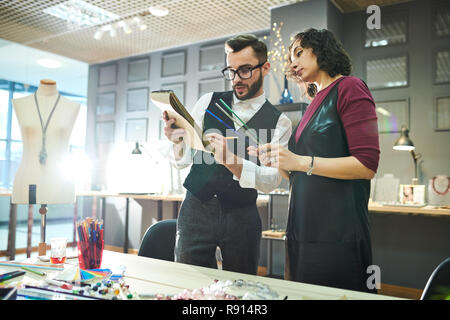 Designers Creating Glass Jewelry Stock Photo