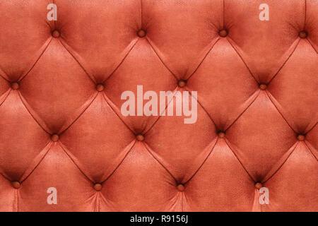 Red textile furniture upholstery with retro pattern background Stock Photo