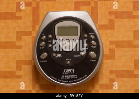 A black CD player on an orange background Stock Photo