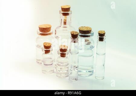 Close up glass measuring beakers for science experiment background Stock Photo