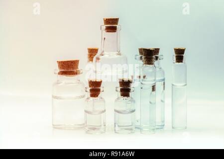 Close up glass measuring beakers for science experiment background Stock Photo