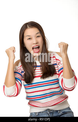 Portrait of a angry Asian American woman displaying a bit of attitude isolated on a white background Stock Photo