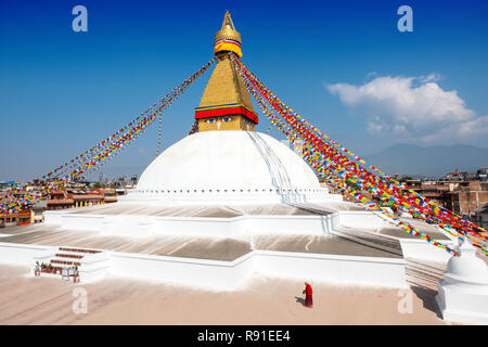 Buddhist monk at Bodhnath (Boudha ) , Asia's largest Buddhist stupa , Kathmandu, Nepal Stock Photo