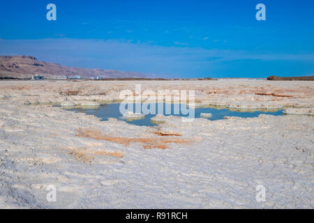 Salt formation caused by the evaporation of the water on the shore of the Dead Sea, Israel Stock Photo