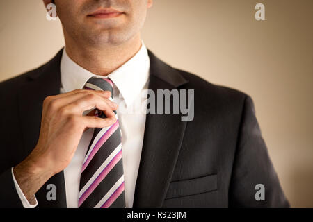 Enthusiastic young business colleagues discussing work. Stock Photo