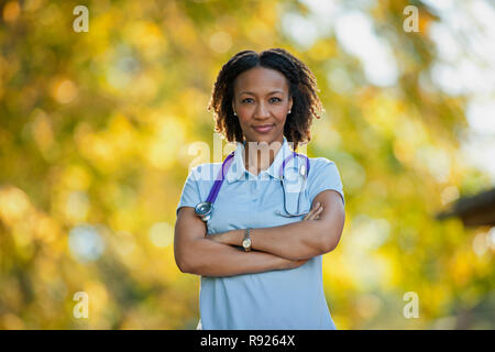 Portrait of a confident female nurse with her arms crossed. Stock Photo