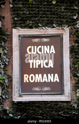 Outdoor advertisement for a typical Roman restaurant (translated from Italian text on the board. Stock Photo