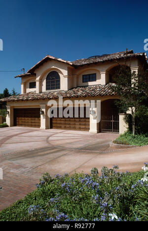 Spanish revival house in San Diego has a circular driveway and four car garage, California, USA Stock Photo