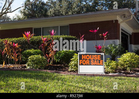 Front Of Middle Class Florida Suburban Home With Palm Trees Fl