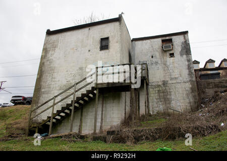 Old Abandoned Building with Wooden Staircase Stock Photo