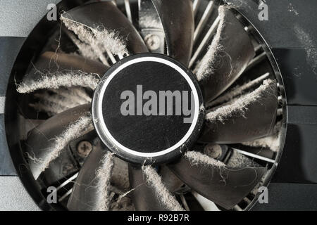 Closeup of dusty computer graphics card fan. Stock Photo