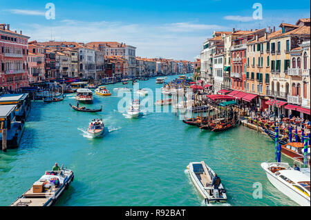 Local activity of people and boats along Canal Grande in Venice, Italy Stock Photo