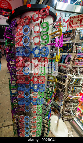 New York, USA. 19th Dec, 2018. A souvenir store in New York displays a selection 2019 New Year's Eve glasses on Tuesday, December 18, 2018. ( © Richard B. Levine) Credit: Richard Levine/Alamy Live News Stock Photo