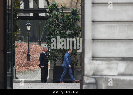 Brussels, Belgium. 19th Dec, 2018. Bart De Wever(R), President of Flemish right-wing party N-VA, leaves a meeting with Belgium's King Philippe at the Royal Palace in Brussels, Belgium, Dec. 19, 2018. After Belgian Prime Minister Charles Michel visited the King on Tuesday evening to submit the resignation of his government, King Philippe announced that he was holding 'his decision in abeyance'. Credit: Zheng Huansong/Xinhua/Alamy Live News Stock Photo
