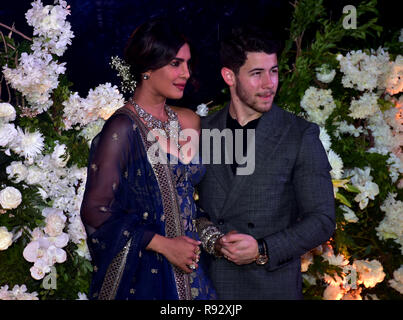 Mumbai, India. 19th Dec, 2018. Indian actress Priyanka Chopra with her husband US musician Nick Jonas are seen during their wedding reception at the hotel JW Marriott in Mumbai. Credit: Azhar Khan/SOPA Images/ZUMA Wire/Alamy Live News Stock Photo