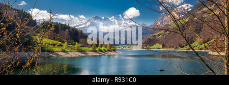 Lungernersee with Swiss Alps. Lungernersee is a natural lake in Obwalden, Switzerland, Europe. Stock Photo